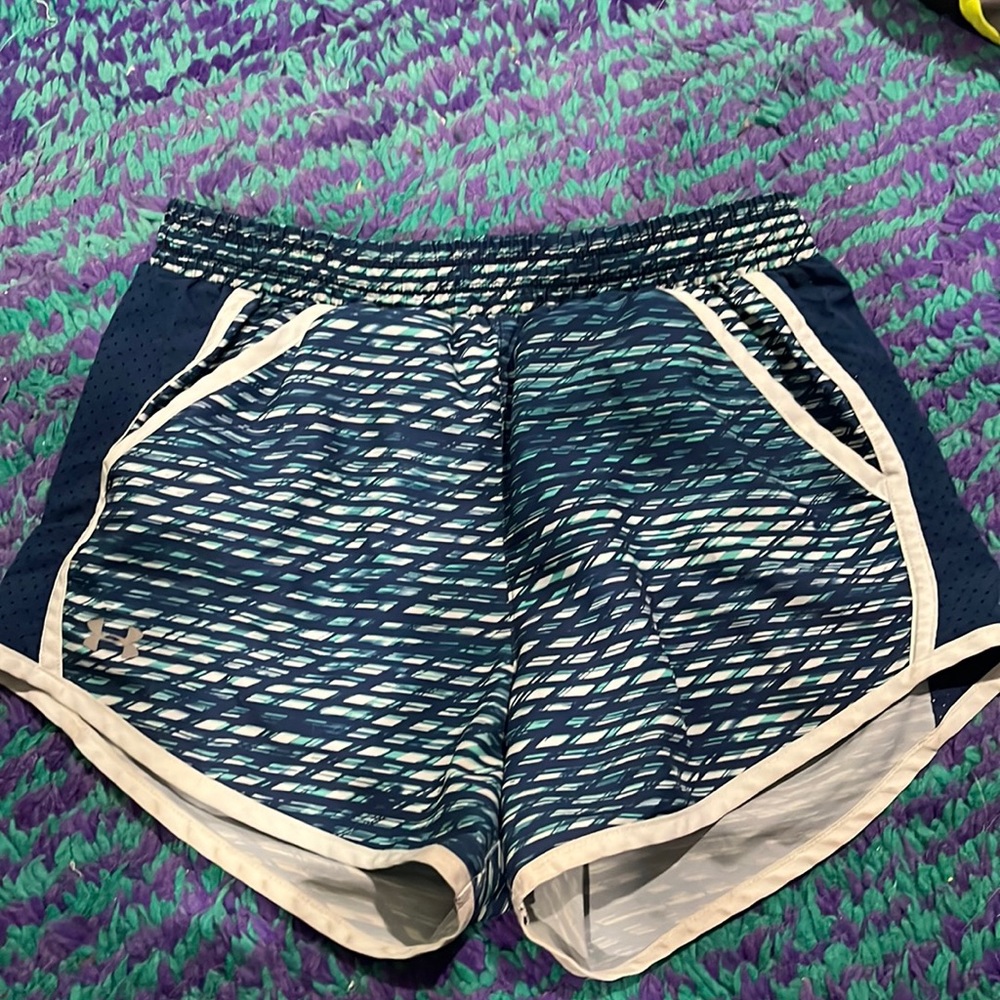Blue and white under armour running shorts